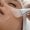 Young,Woman,During,Face,Peeling,Procedure,In,Salon,,Closeup